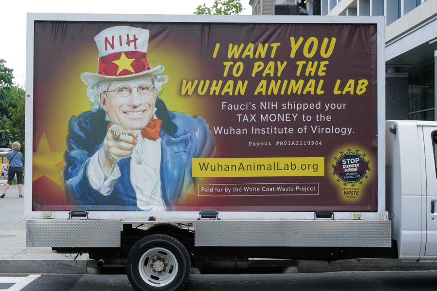  A truck feature a likeness of Dr. Anthony Fauci as Uncle Sam and questioning his supposed expenditures through the NIH on dangerous animal virus experiments in China.